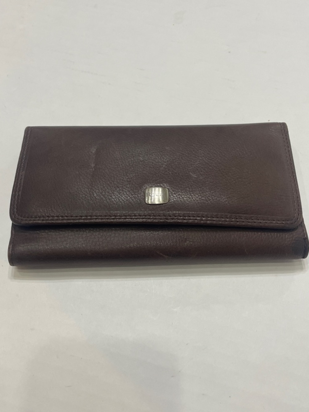 Vintage Rolf’s Brown Leather Trifold Wallet with Silver Logo Plate. Preowned.